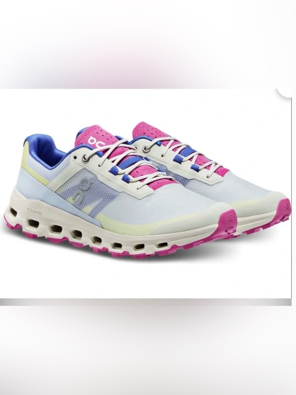 On Running Kids Sneakers in White with Yellow, Blue & Pink Accents